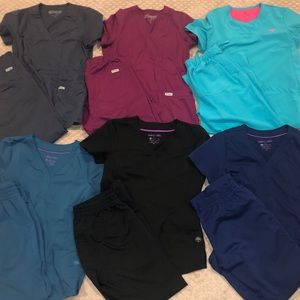 2 pairs of scrubs. Tops: XS. Bottoms: XS petite